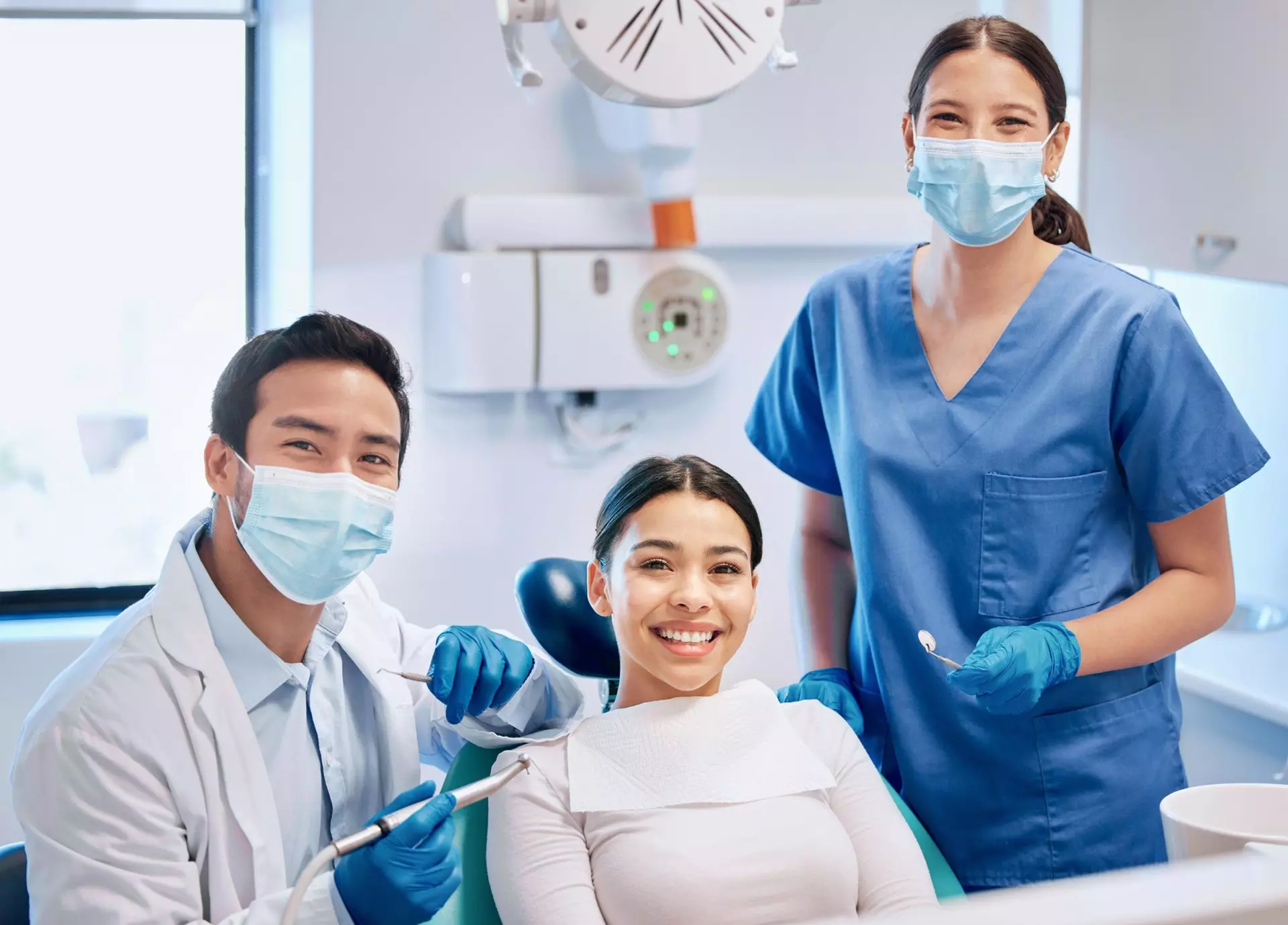 Dentist discussing comfortable dental care with a patient at Flex Dental